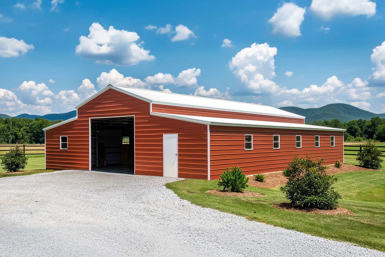 Standard red metal barn with white trim for agricultural use